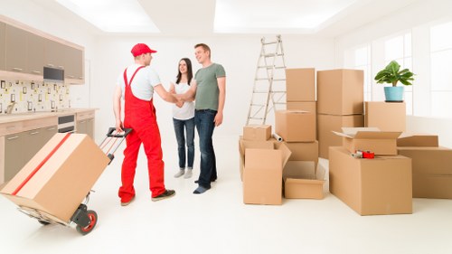 Local movers loading boxes for a Paddington property move